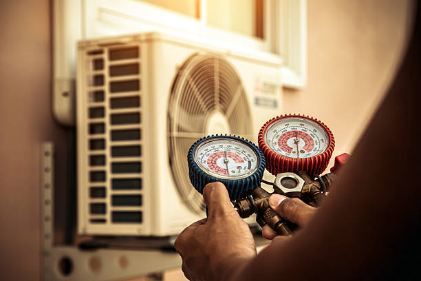 Professional Heat Pump Repair technician working in Saluda, NC